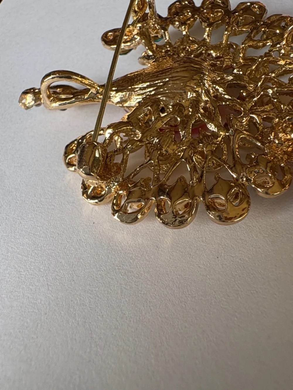 Gold Peacock Brooch with Multicolor and Red Center